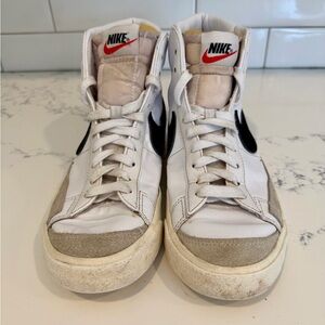 Woman's Nike High-Top Sneakers in White and Black